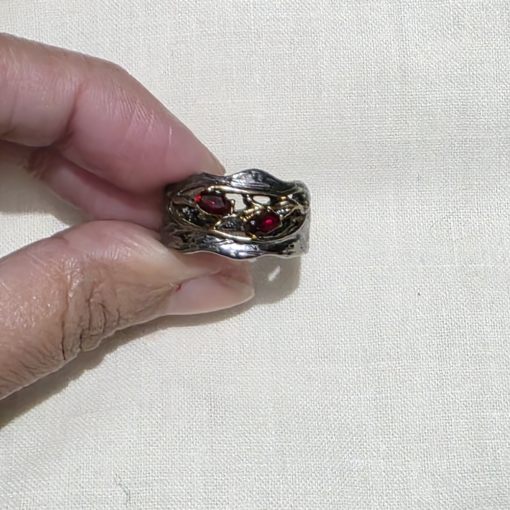 Elegant Silver and Gold Ring with Red Accents